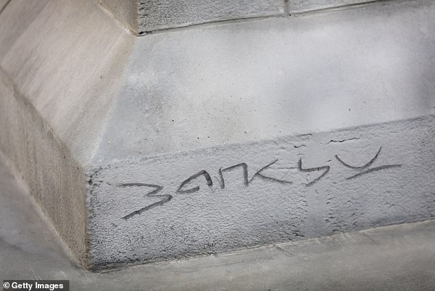 Banksy's famous signature was inscribed at the bottom of the sculpture - but the artist has not yet confirmed whether he is behind this latest piece of political art