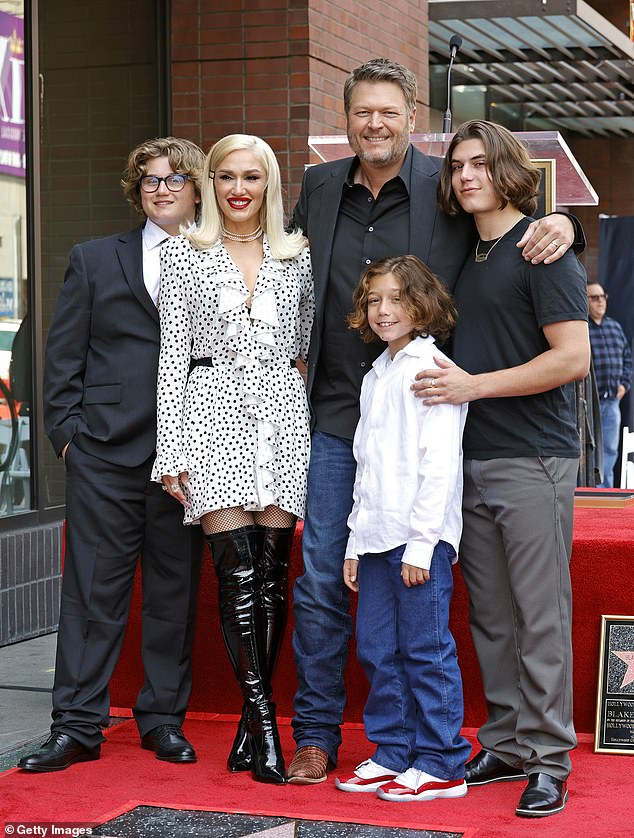 Stefani and her three sons seen with her new husband Blake Shelton in 2023