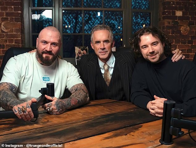 Davis and his co-presenter Laurence McKenna (right) with Canadian psychologist and author Jordan Peterson (centre)