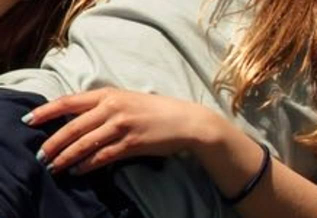 Charlotte sported funky blue nail polish in the photo, enjoying the sunshine while showing off her new manicure