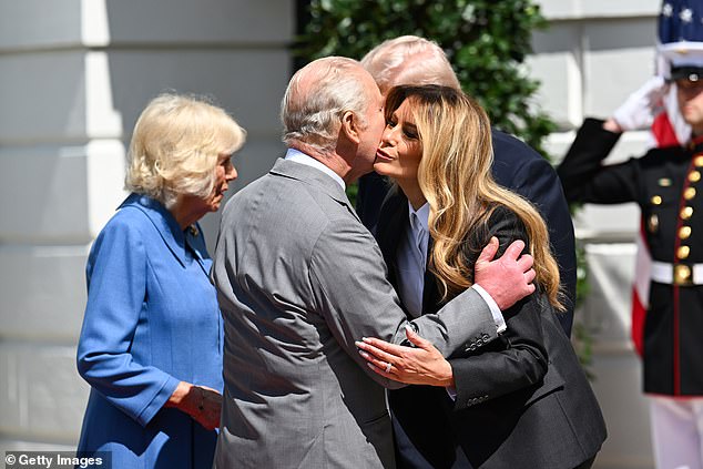 Charles and Melania kiss each other the cheek before the King and Queen Camilla depart the White House -- April 30, 2026