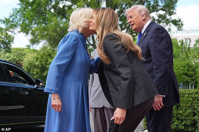 Queen Camilla kisses Melania Trump on the cheek as Her Majesty is greeted for a departure ceremony on the South Lawn of the White House -- April 30, 2026