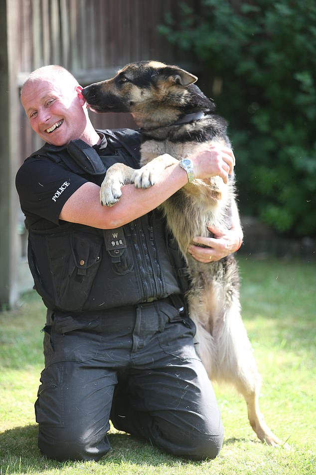 The Somali-born British national was accused of stabbing PC Neil Sampson and his German Shepherd Anya (both pictured) in 2008