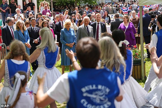 King Charles III and Queen Camilla attend a parade on the final day of their state visit