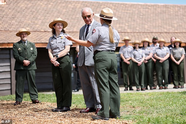 King Charles III speaks with National Park Service Rangers at the Shenandoah National Park