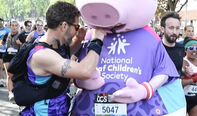 Harry Styles fans have become convinced that the singer has disguised himself as Daddy Pig to take part in Sunday's London Marathon