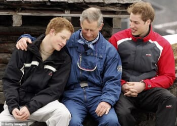 Prince Harry pictured with his father, then-Prince Charles, and Prince William during the Royal Family's skiing holiday in March 2005