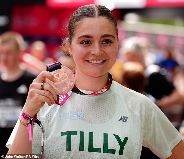 Aspiring chef Tilly, 24, ran the iconic route around London in four hours and one minute