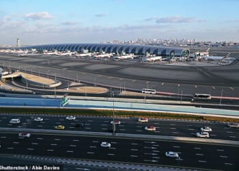Dubai police snooped on a private WhatsApp group to snare an airline worker who shared images of a building damaged in the Middle East crisis (Dubai International Airport pictured)