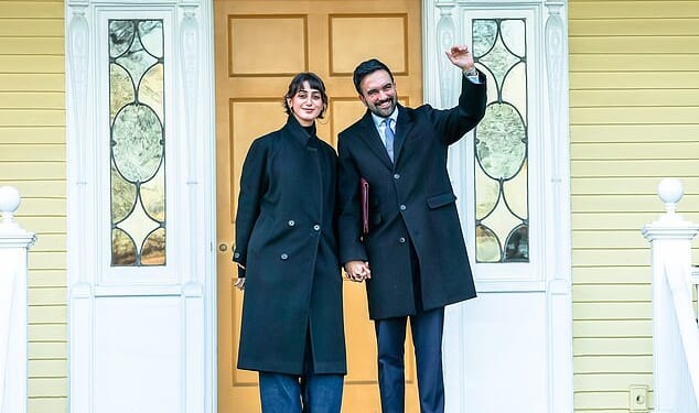 Mayor Zohran Mamdani and his wife Rama Duwaji standing in front of the city-owned $100million Gracie Mansion, where they moved into on January 12 at the start of his term