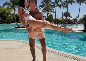 Amy Childs showed off her toned physique in a plunging swimsuit as she shared a sweet tribute to her fiancé Billy Delbosq on Wednesday