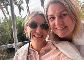 Michelle Maguire pictured, left, with her friend on holiday before the pair - and their children - were abandoned in Malaga amid new EU travel rules
