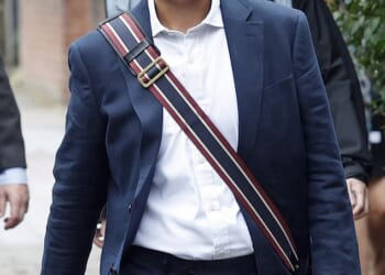 Five officers are believed to have mistakenly abandoned the bag outside the property belonging to the Labour mayor (pictured walking near his home) in Clapham, south London, at around 9.30pm on Tuesday