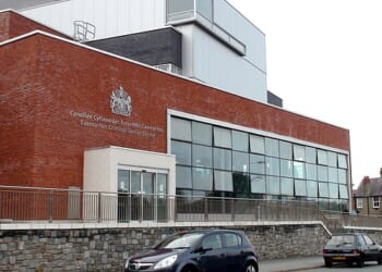 The men face 28 charges between them and are on trial at Caernarfon Crown Court in Wales