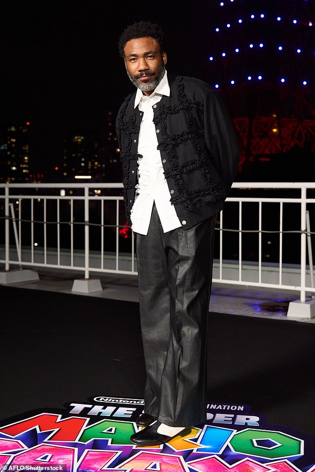 The under-fire broadcaster used an unspecified track by Childish Gambino, AKA Donald Glover (pictured) - unaware that its lyrics contained the N word