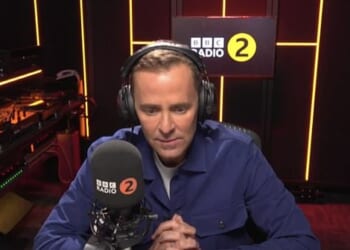 Radio 2 presenter Scott Mills was fired by the BBC after 'compelling' new evidence from an underage accuser emerged a decade after a police probe, it has been claimed