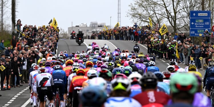 Brit cyclist, 51, dies after collapsing while competing in Tour of Flanders race with son as 2 other bikers resuscitated