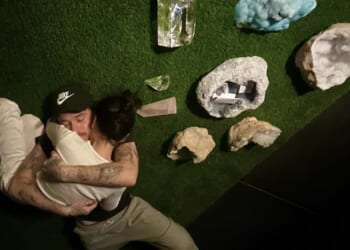 Brooklyn Beckham, 27, tightly embraced his wife Nicola Peltz, 31, during a crystal healing practice at their home in Los Angeles on Saturday