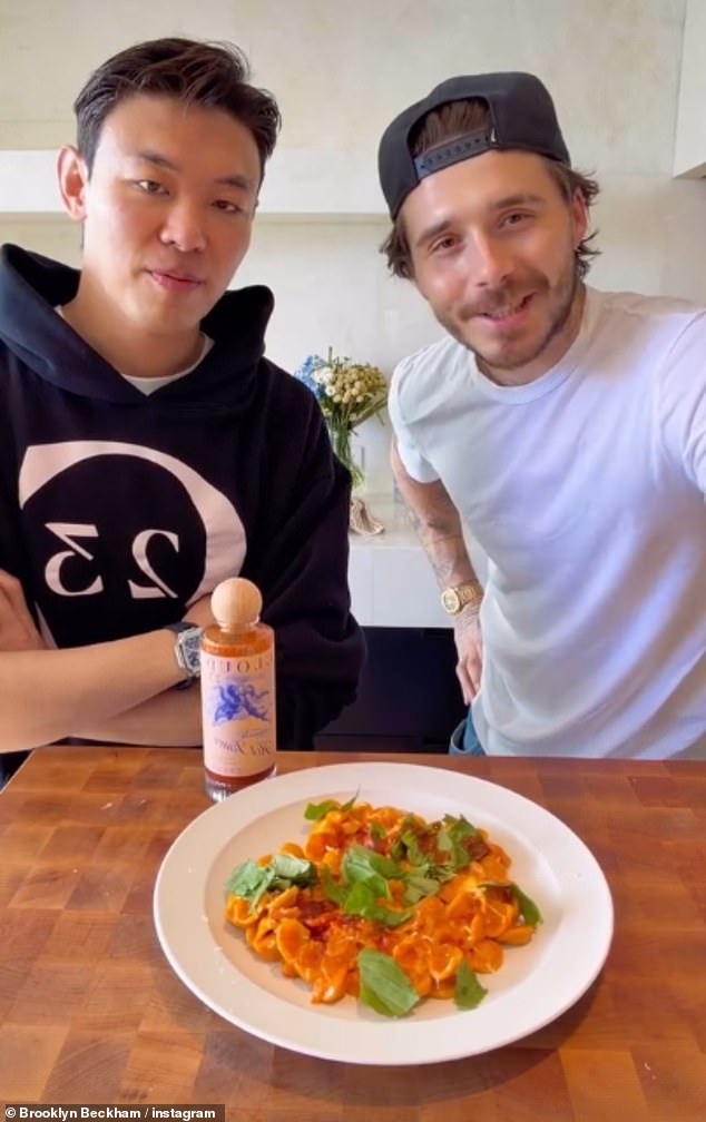 The aspiring chef posted another cooking video which also promoted his Cloud 23 hot sauce, but followers were distracted by his 'basic' cooking skills as well as his sentimental watch