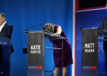 Katie Porter, center, reacts during a California gubernatorial debate Tuesday hosted by CBS LA at Pomona College in Claremont, California.