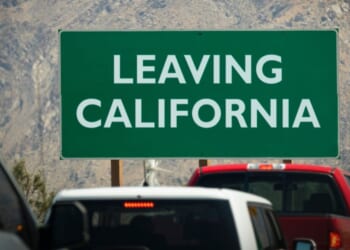 A leaving California sign at the border of the Golden State.