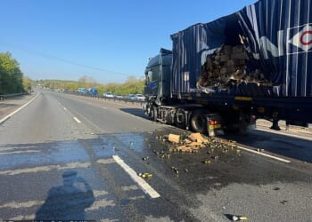 A motorway was closed for more than seven hours after 20 tonnes of prosecco flowed down the road following a lorry crash