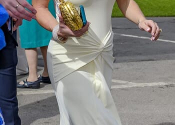 Coleen Rooney wowed in figure-hugging cream dress as she arrived at Aintree racecourse for the Randox Grand National Festival Day on Saturday