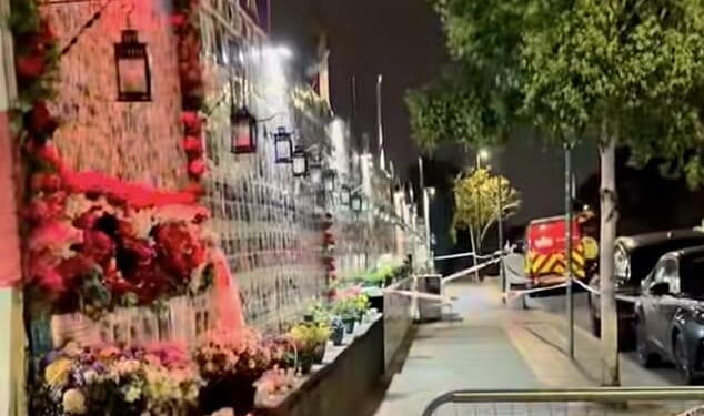 Detectives are probing an attempt to set fire to a memorial wall dedicated to the fallen victims of the Iranian regime, in Golders Green, last night. It has been sealed off (pictured last night)