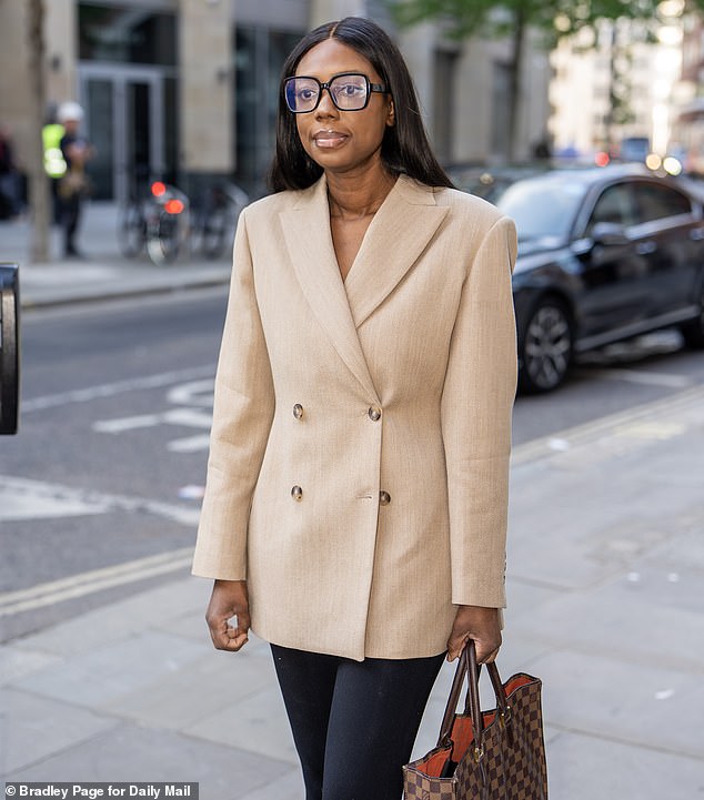Former Channel 5 star Claudia-Liza Vanderpuije pictured arriving at London Tribunal Centre on Monday for the first day of a five-week employment hearing