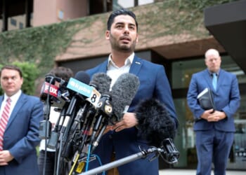 Ammar Campa-Najjar, a Democrat candidate who was running for congress in Rep. Duncan Hunter's district, speaks to reporters outside the Federal Courthouse in San Diego, California, on Dec. 3, 2019.