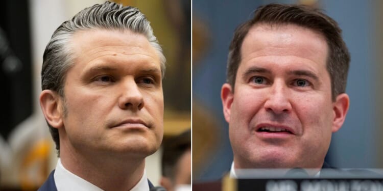 Rep. Seth Moulton, right, a Massachusetts Democrat, suggested on CNN that War Secretary Pete Hegseth deserves to be executed for his part in a September attack on a drug boat in the Caribbean.