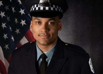Chicago Police Officer Carlos Baker is facing a wrongful death suit in the case