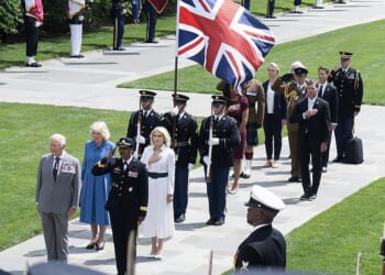 Diplomatic gaffe threatens red (white and blue) faces all round during King and Queen's visit to Virginia's Arlington National Cemetery... but can you spot what's wrong?