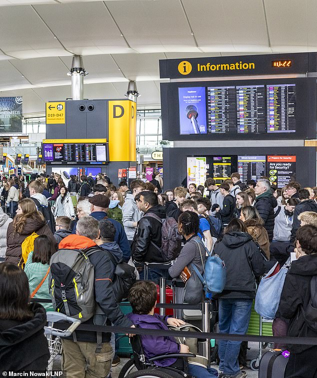 Passengers still face long queues at airports - despite the six-month roll-out of the EES digital border system - as airports across Europe struggle with the new technology (Pictured: queues at Heathrow Airport Terminal 2 pictured earlier this month)