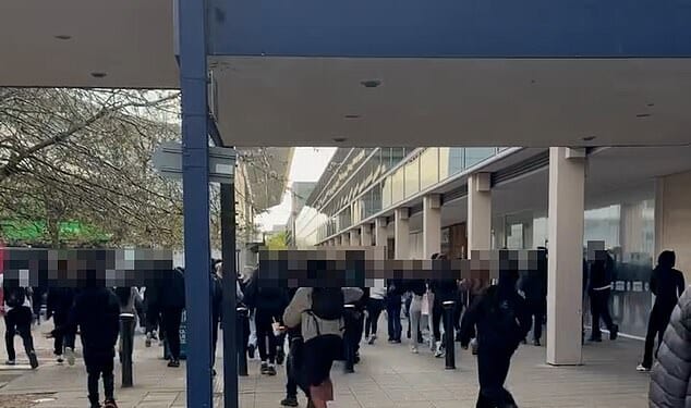 Clips show the balaclava-clad teenagers running away from officers in Milton Keynes on Saturday