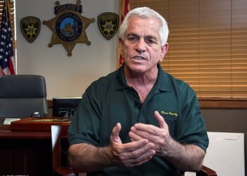 Pima County Sheriff Chris Nanos has been called on by local officials to answer questions about his past as he faces growing scrutiny over his handling of the Nancy Guthrie case