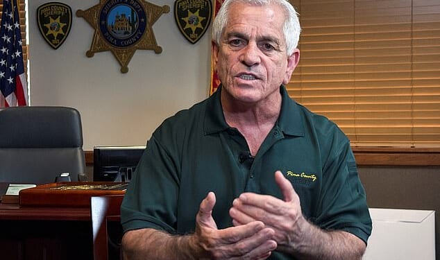 Pima County Sheriff Chris Nanos has been called on by local officials to answer questions about his past as he faces growing scrutiny over his handling of the Nancy Guthrie case