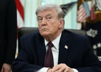 President Donald Trump takes a question from a reporter in the Oval Office of the White House in Washington, DC on March 31, 2026.