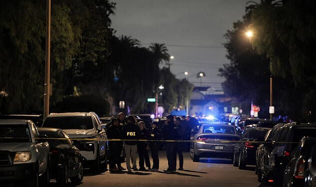 FBI agents and police officers work outside the residence associated with Cole Tomas Allen