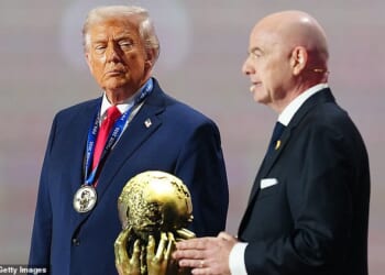 A top Donald Trump envoy reportedly asked FIFA President Gianna Infantino (right) to kick Iran out of the World Cup and replace them with Italy