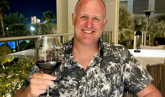 Gavin Whit (pictured), 46, was away with family in July 2023 when he suffered a seizure on the beach and was given six to 14 months to live