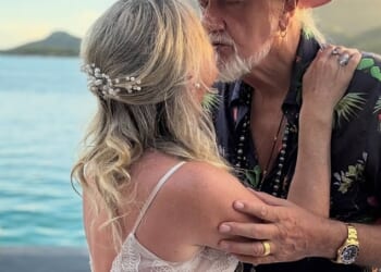 Fleetwood Mac drummer Mick Fleetwood has secretly tied the knot for the fifth time (pictured with his new wife Elizabeth Jordan)
