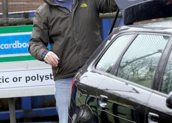 Disgraced funeral director Robert Bush, 48, (pictured) left 35 bodies unburied and kept 100 sets of ashes from grieving families at Legacy Independent Funeral Directors in Hull, East Yorkshire. Pictured: Mr Bush dumping items at a rubbish tip near his bail address on Saturday