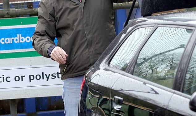 Disgraced funeral director Robert Bush, 48, (pictured) left 35 bodies unburied and kept 100 sets of ashes from grieving families at Legacy Independent Funeral Directors in Hull, East Yorkshire. Pictured: Mr Bush dumping items at a rubbish tip near his bail address on Saturday