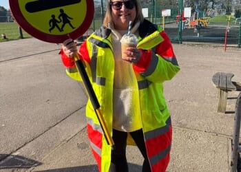 Sarah Middleton has supervised children across Church Road, in Ferndown, Dorset, for 18 months and has been recognised as an 'unsung community hero'