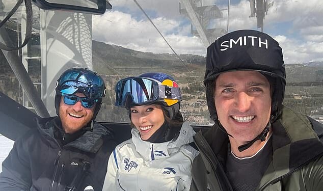 Prince Harry was all smiles as he posed for a ski lift selfie alongside Winter Olympics champion Eileen Gu and former Canadian prime minister Justin Trudeau during a star-studded trip to the slopes