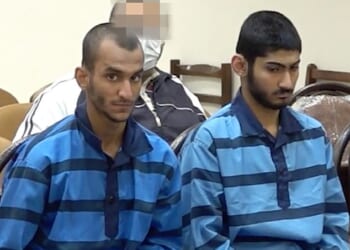 Pictured: Erfan Amiri, 17, and Ehsan Hesarlu, 18, had already ¿confessed¿ to arson during January¿s anti-regime protests following weeks of abuse at the hands of the Iranian police