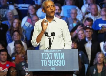 Former President Barack Obama, pictured above campaigning in October, played a critical role in the Virginia redistricting referendum vote this past week