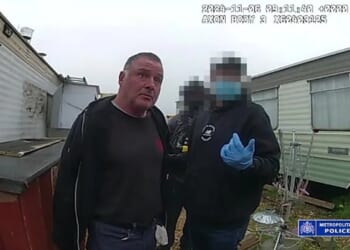 Thomas McKenna being arrested for using a caravan at Buckles Lane in Essex as the base for an underworld weapons workshop
