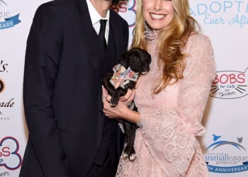 Howard Stern and his wife Beth Otrosky Stern are being sued by their former employee who claims the couple fostered a hostile work environment and used a false non-disclosure agreement to 'silence' her - the couple are pictured in 2019